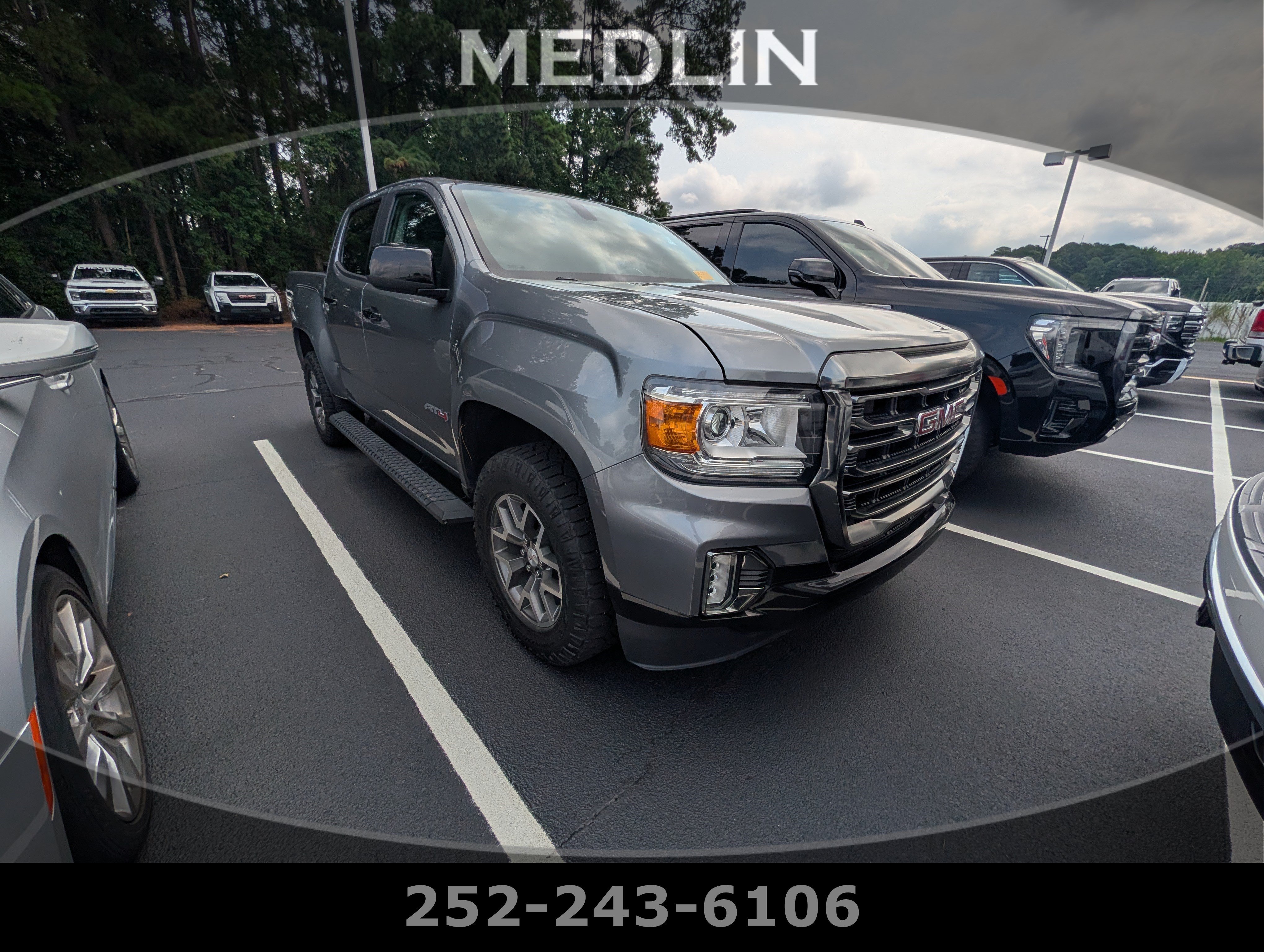 Used 2022 Satin Steel Metallic GMC 4WD AT4 w/Leather image 1