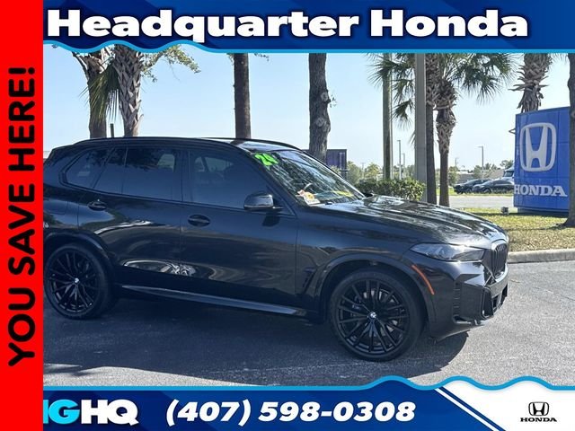 Used 2024 Black Sapphire Metallic BMW xDrive40i image 1