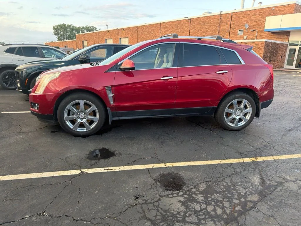 Used 2010 Red Cadillac Performance image 1