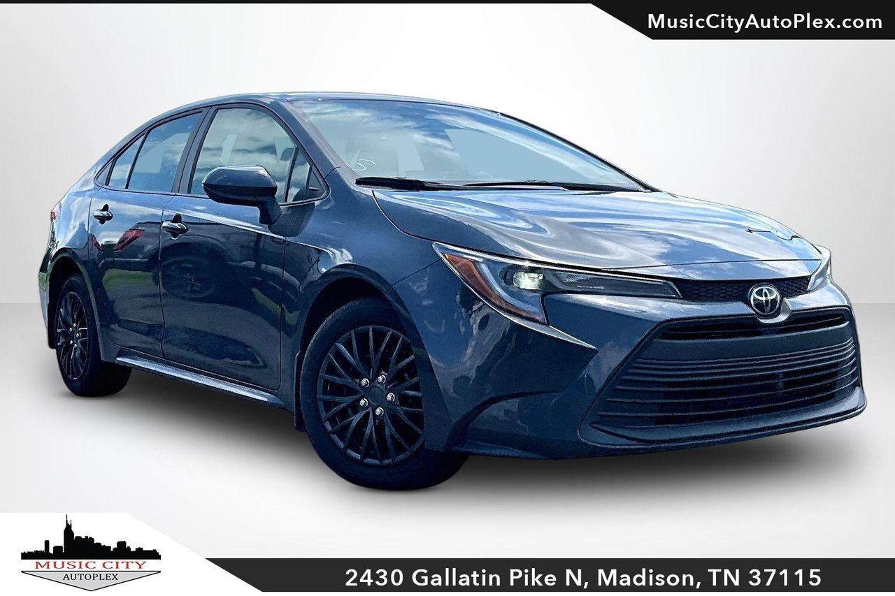 Used 2025 Black Toyota LE image 1