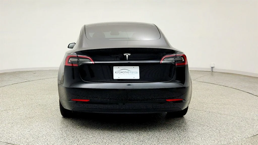 Used 2023 Solid Black Tesla RWD image 6