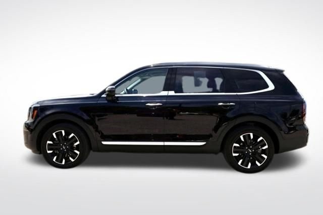 Used 2025 Ebony Black Kia SX-Prestige image 6