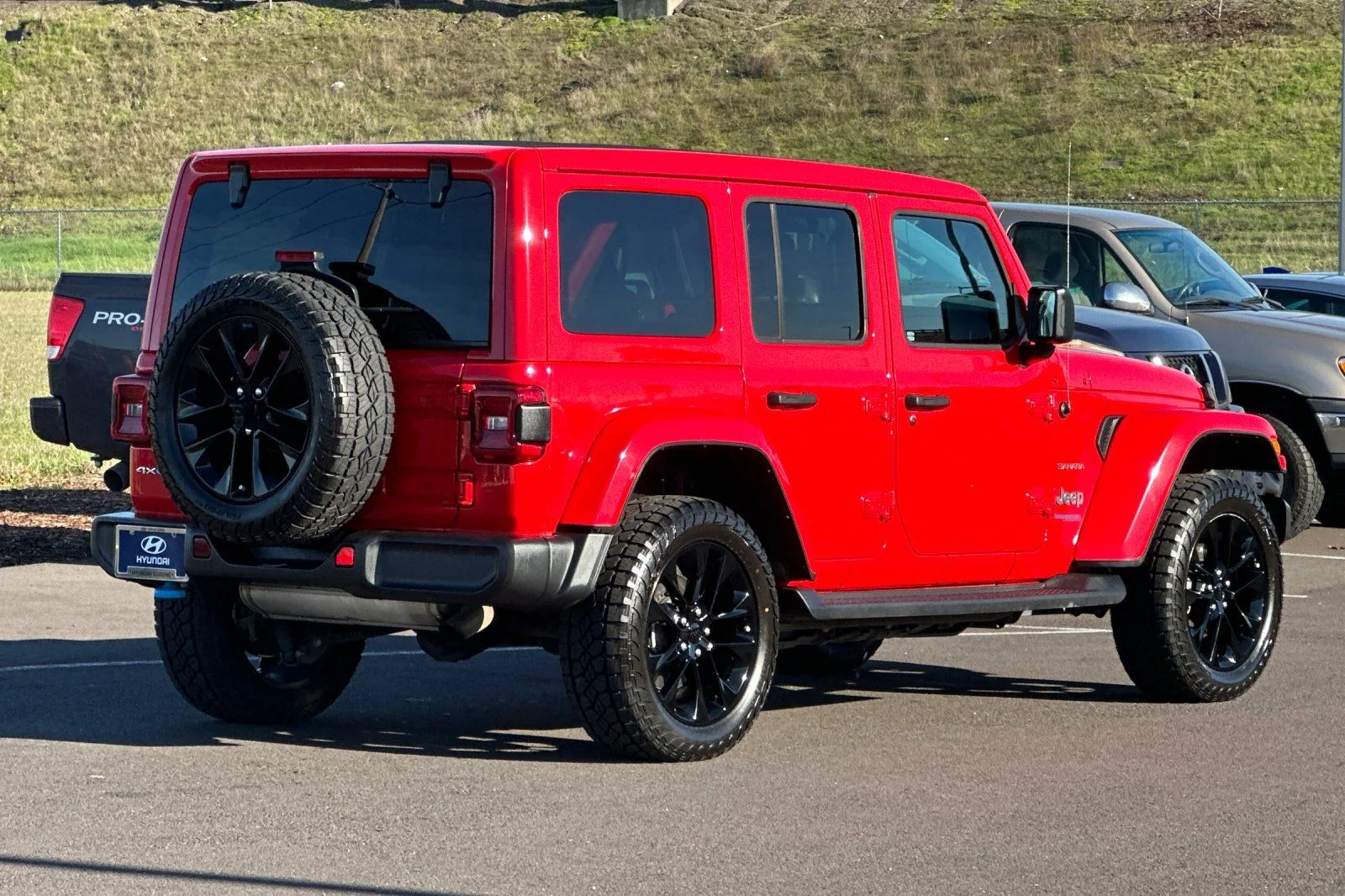 Used 2022 Red Jeep Unlimited Sahara 4xe image 3