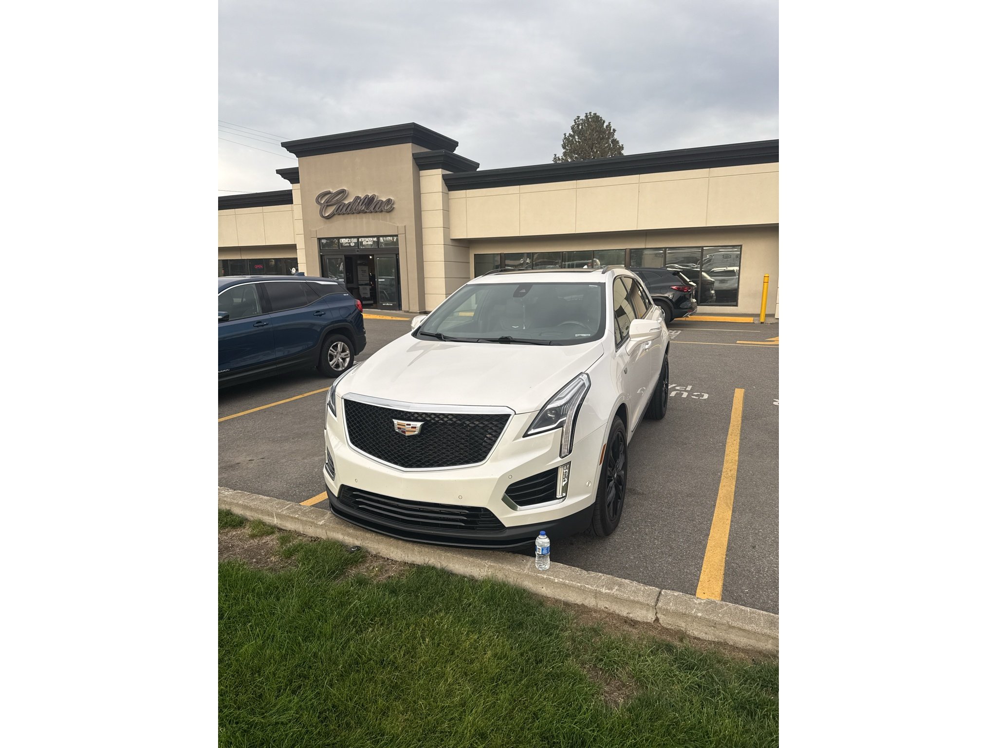 Used 2021 CRYSTAL WHITE TRICOAT Cadillac AWD Sport image 1