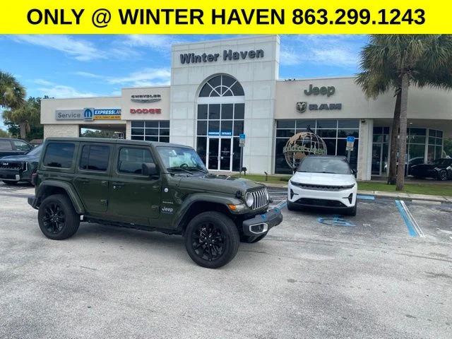 Used 2024 Green Jeep Sahara 4xe image 1