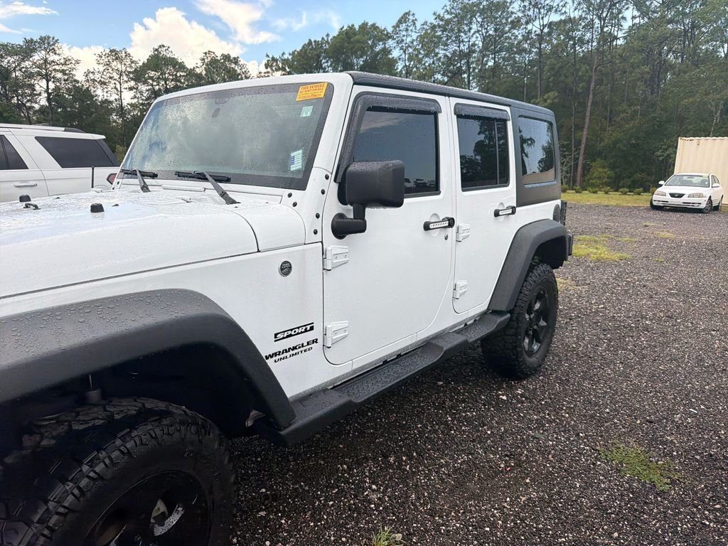 Used 2017 White Jeep Unlimited Sport image 4