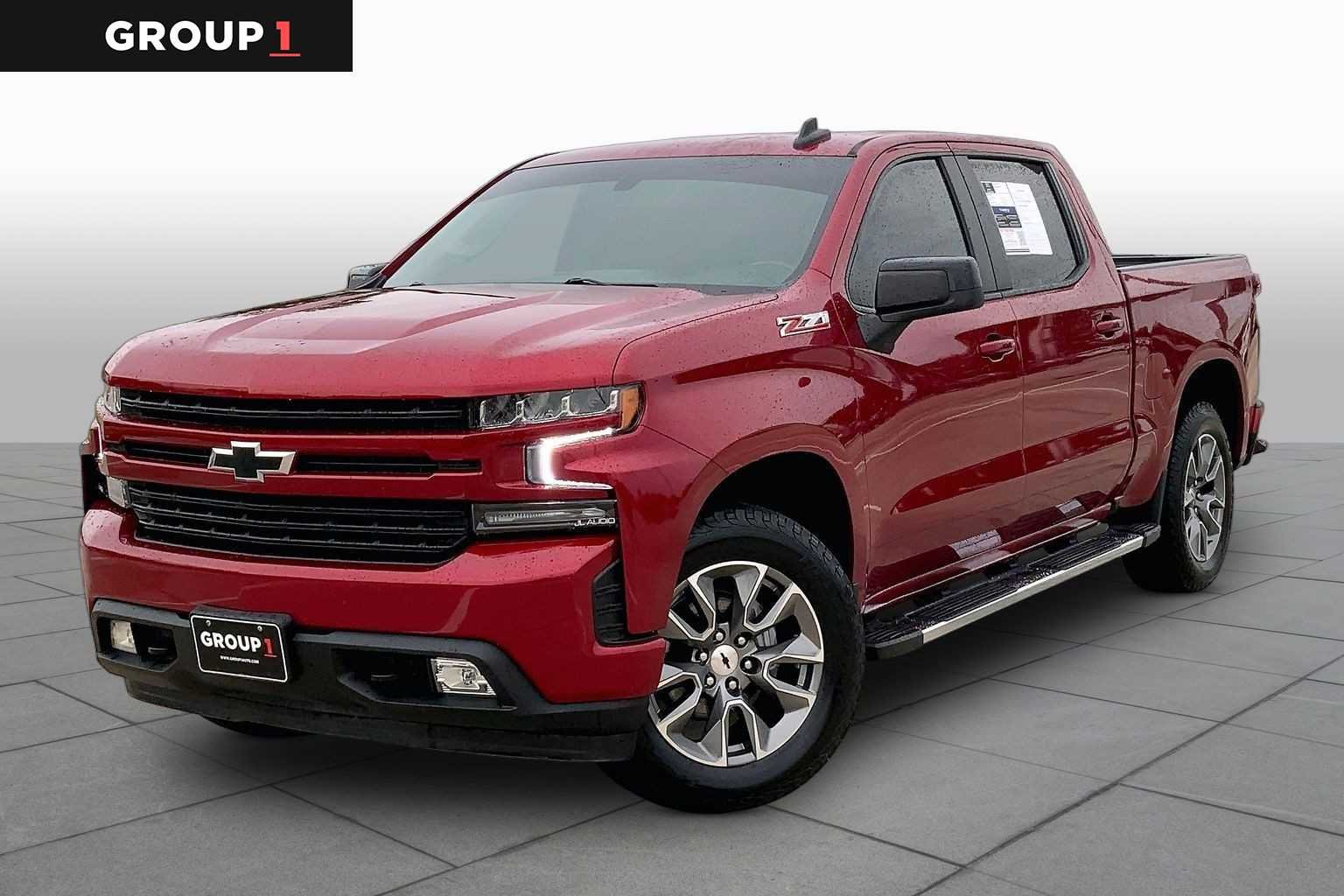 Used 2021 CHERRY RED TINTCOAT Chevrolet RST image 1