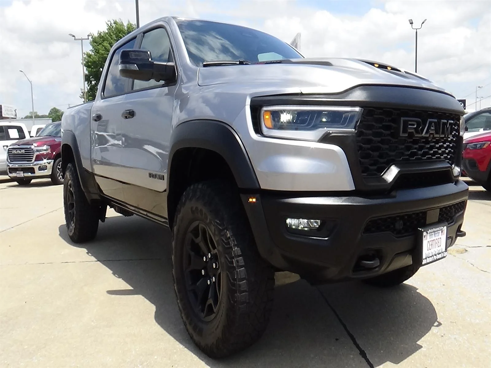 Used 2025 Billet Silver Metallic Clear Coat/Diamond Black Cr RAM RHO image 4