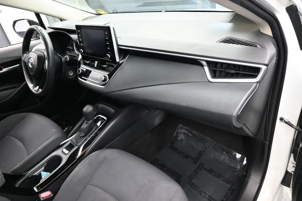 Used 2021 Super White Toyota LE image 34