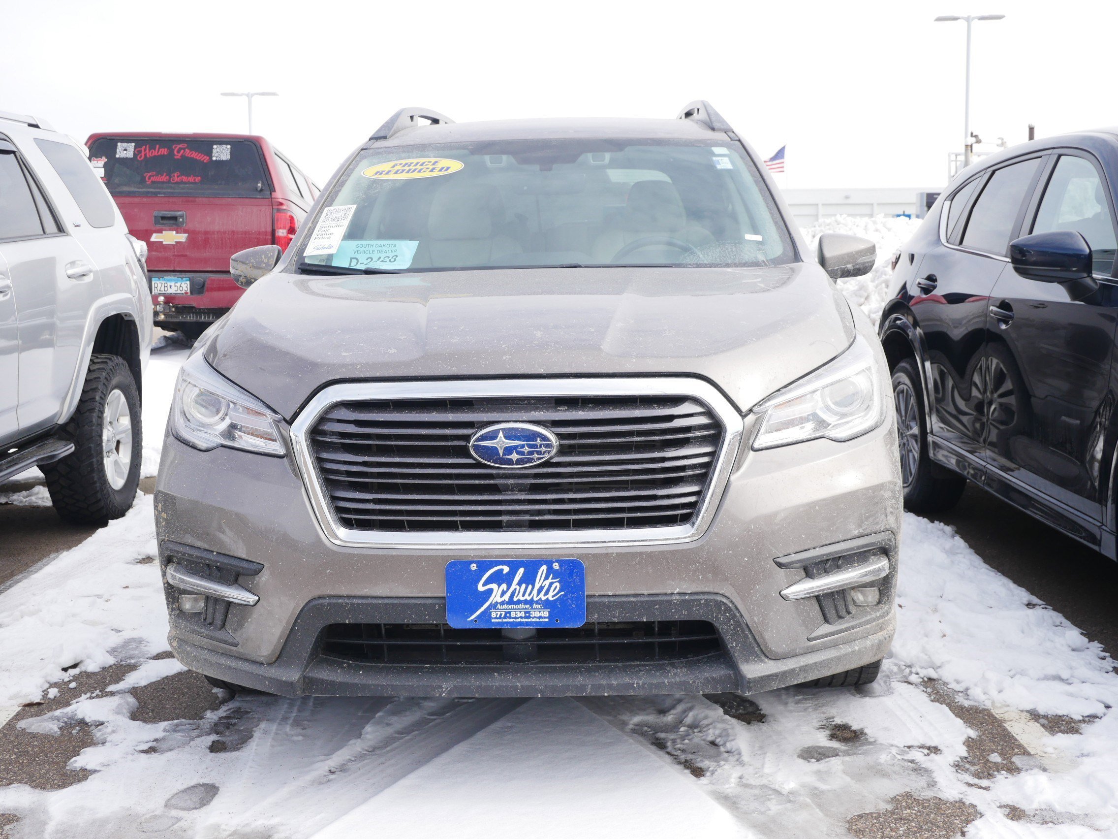 Used 2021 Subaru Ascent Limited with VIN 4S4WMAMD1M3423431 for sale in Brooklyn Center, Minnesota