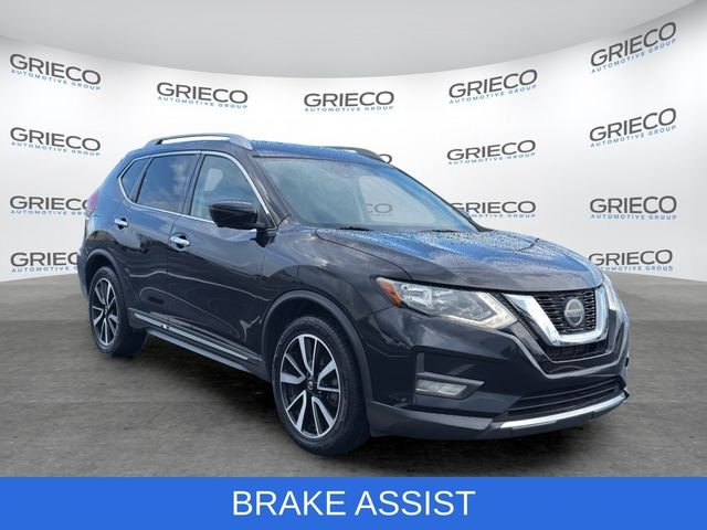 Used 2020 Black Nissan SL image 1