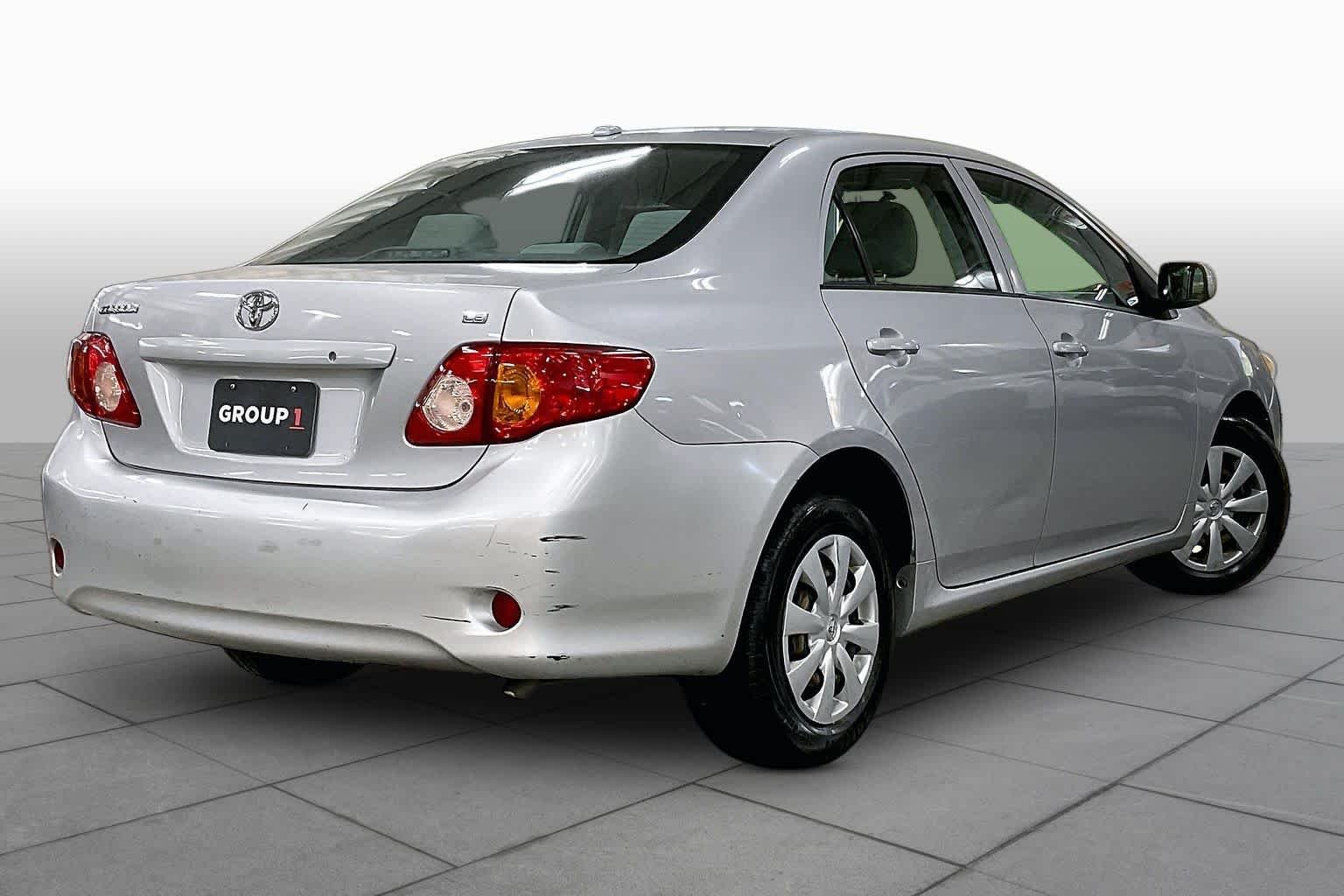 Used 2010 Classic Silver Metallic Toyota LE image 12