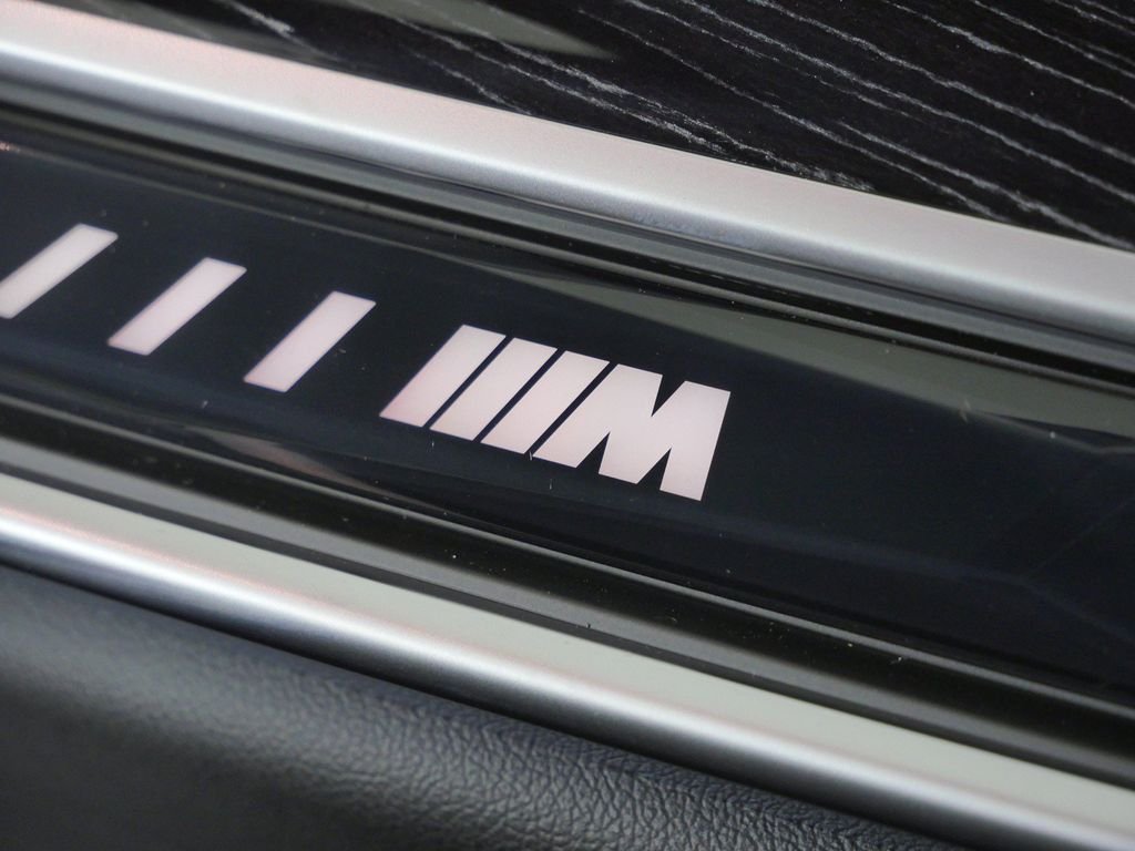 New 2026 Black Sapphire Metallic BMW M60i image 24