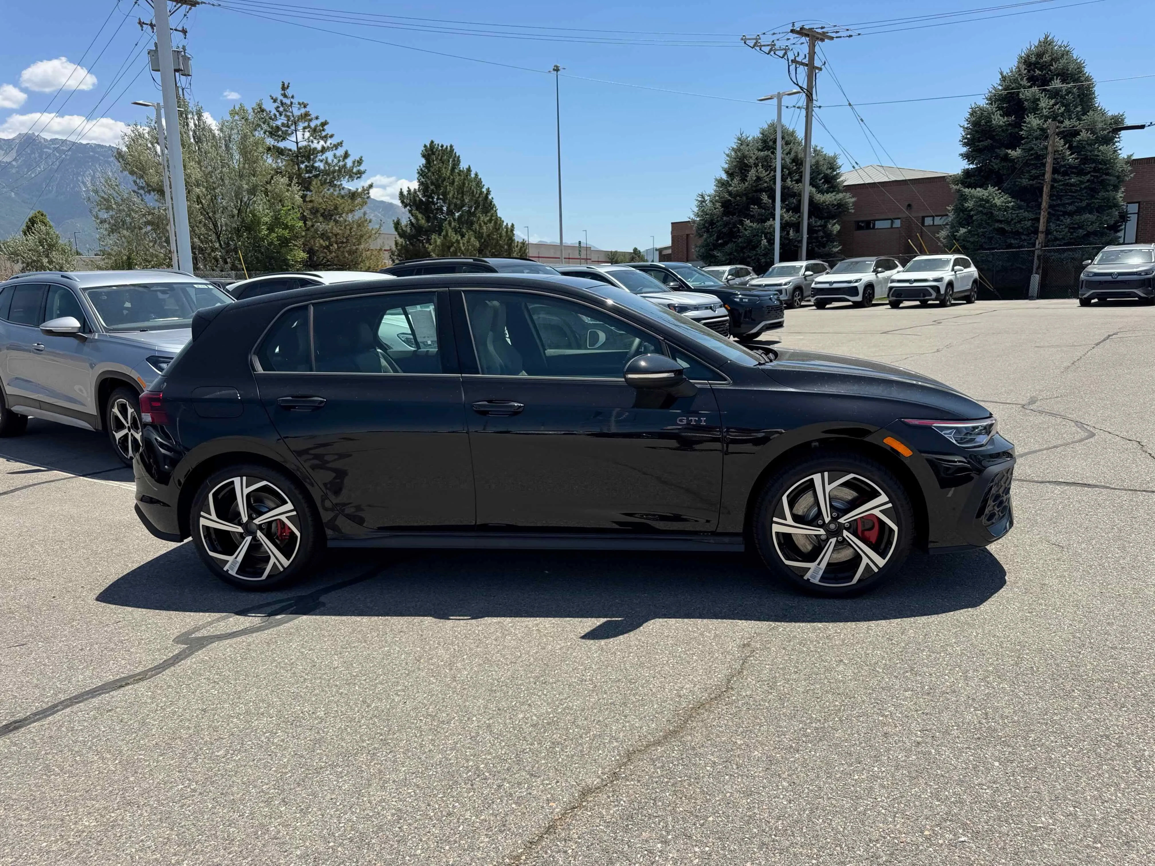New 2025 Black Volkswagen SE image 8
