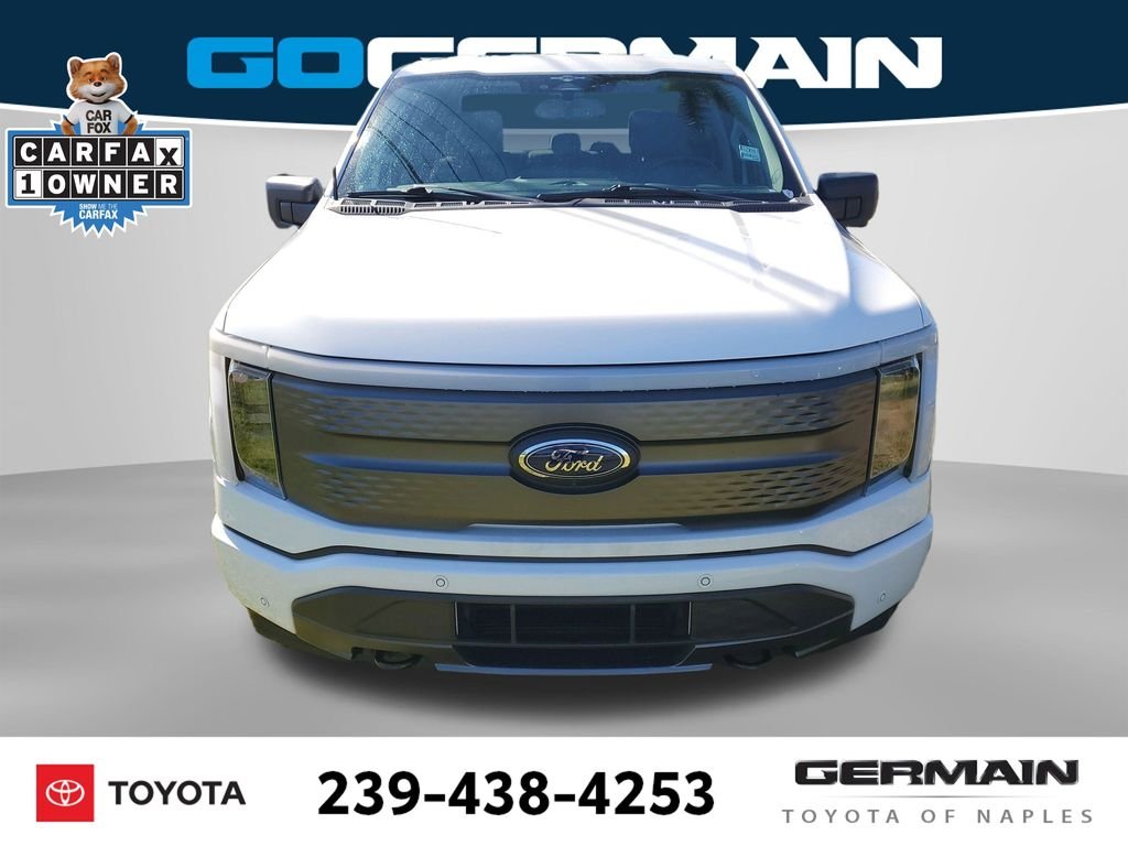 Used 2023 Ford F-150 Lightning XLT with VIN 1FTVW1EL7PWG34488 for sale in Naples, FL