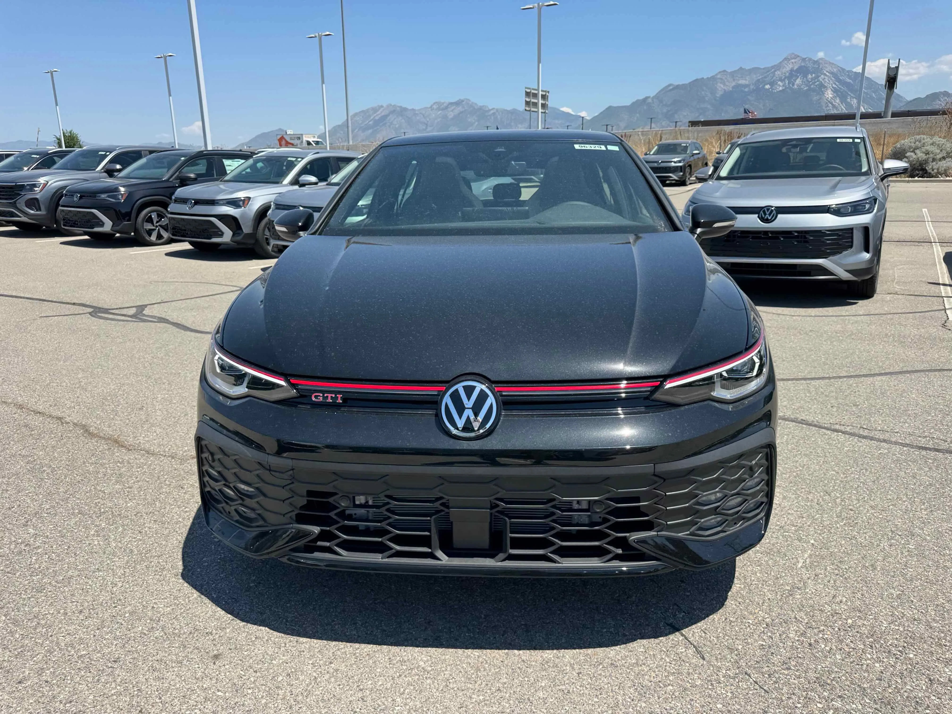 New 2025 Black Volkswagen SE image 10
