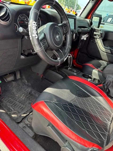Used 2016 Firecracker Red Clearcoat Jeep Unlimited Sport image 7
