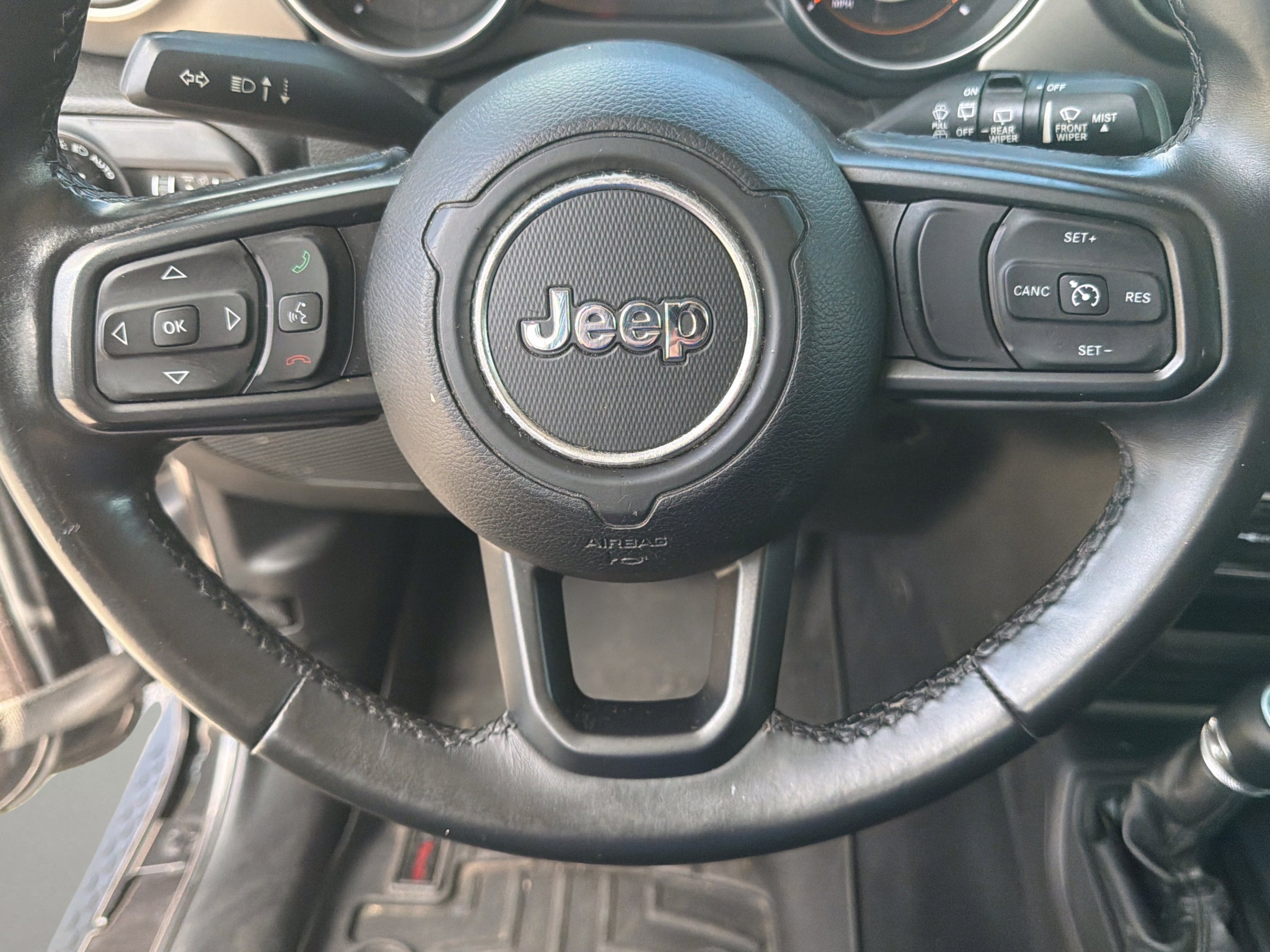 Used 2018 Granite Crystal Metallic Clearcoat Jeep Sport S image 16