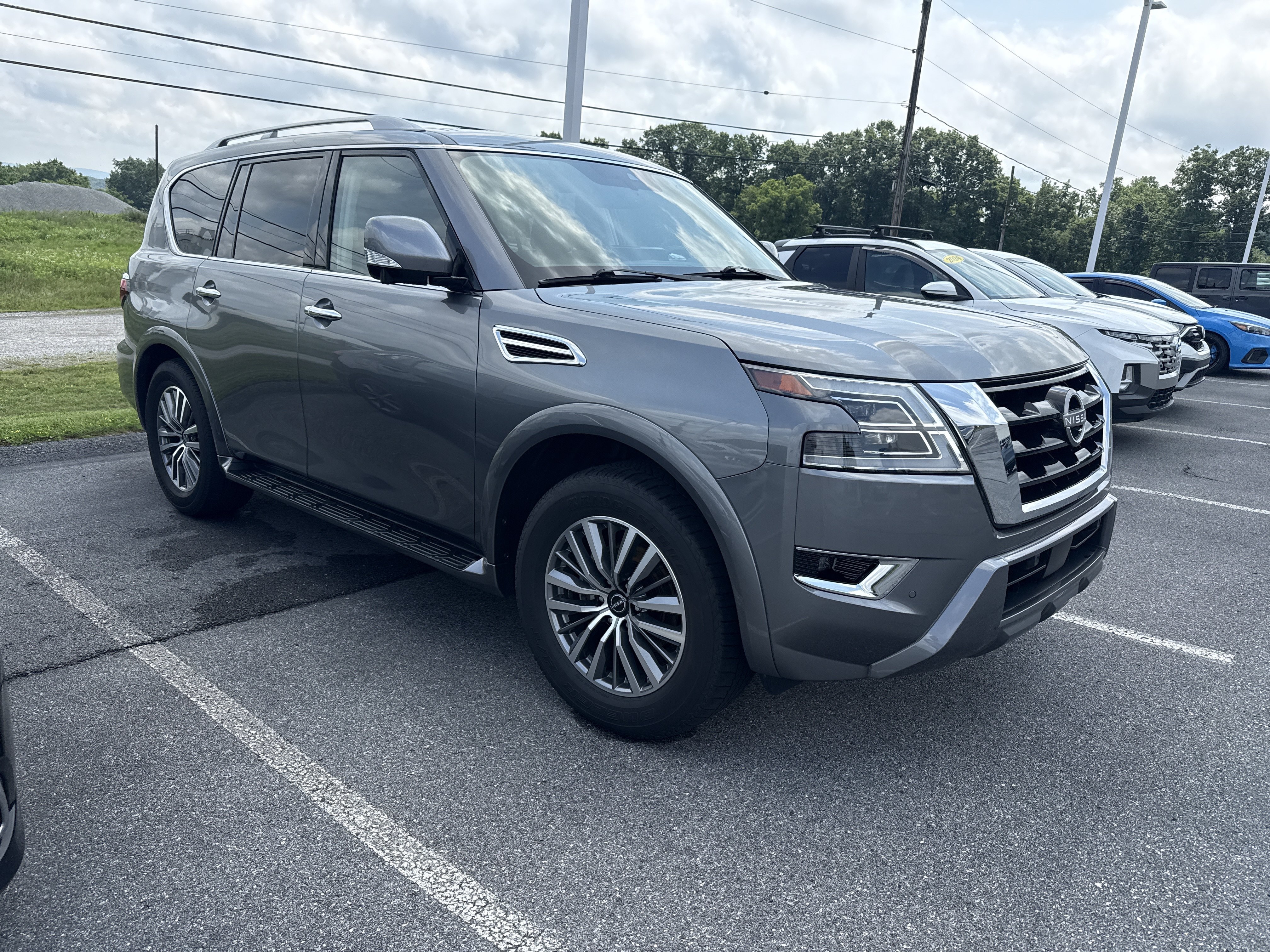 Used 2024 Gun Metallic Nissan SL image 2