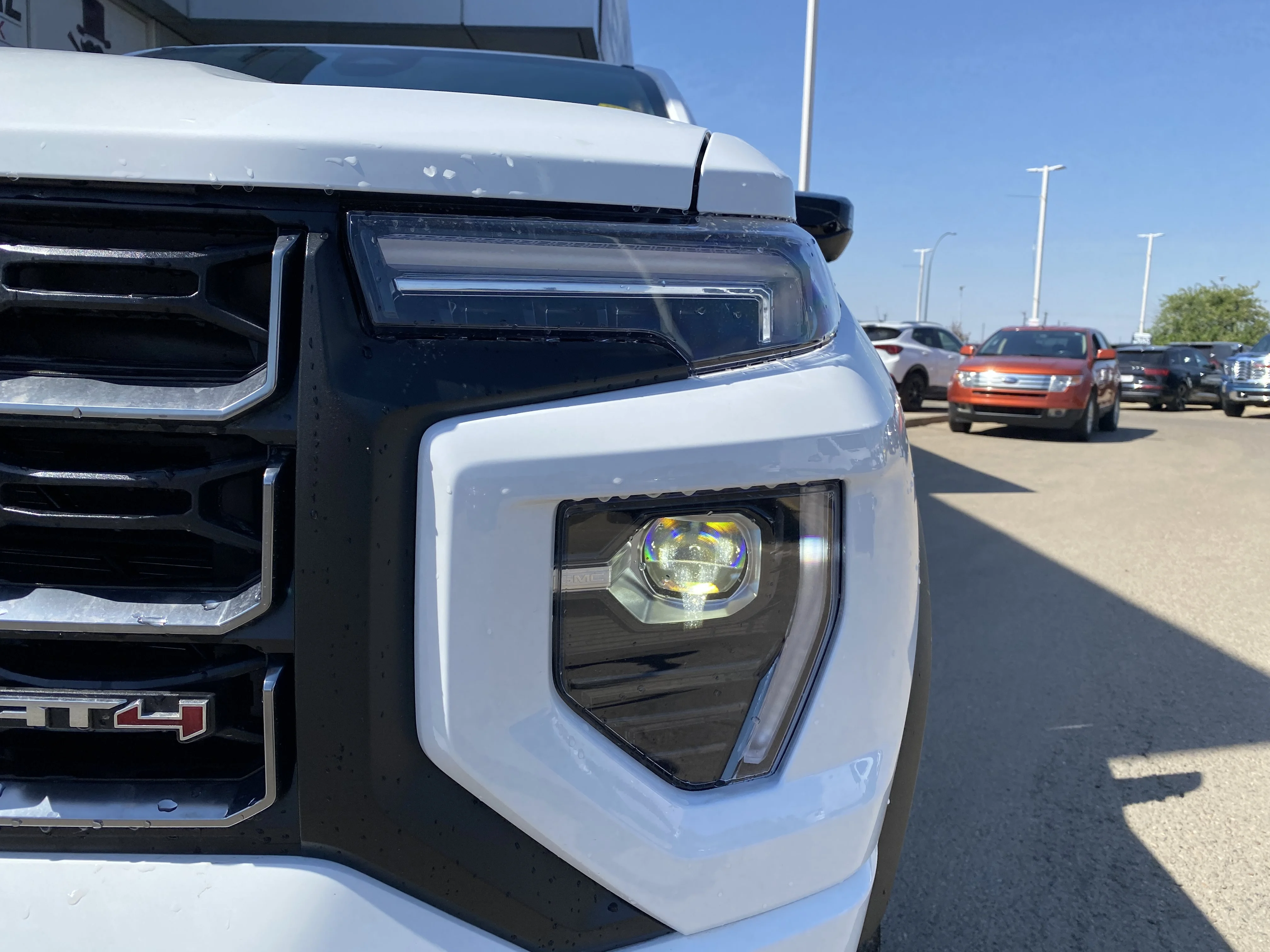 New 2026 Summit White GMC 4WD AT4 image 9