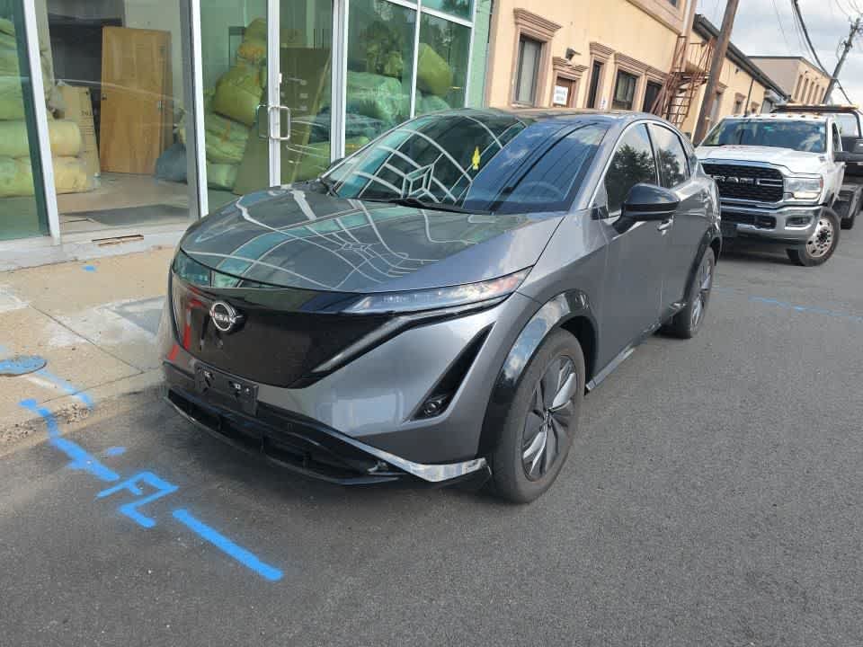 Used 2024 Gun Metallic Nissan EVOLVE+ image 2
