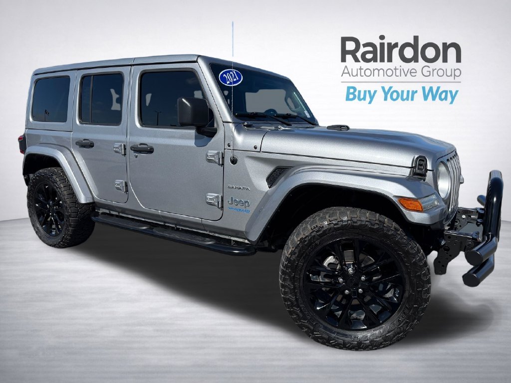 Used 2021 Silver Jeep Unlimited Sahara 4xe image 1
