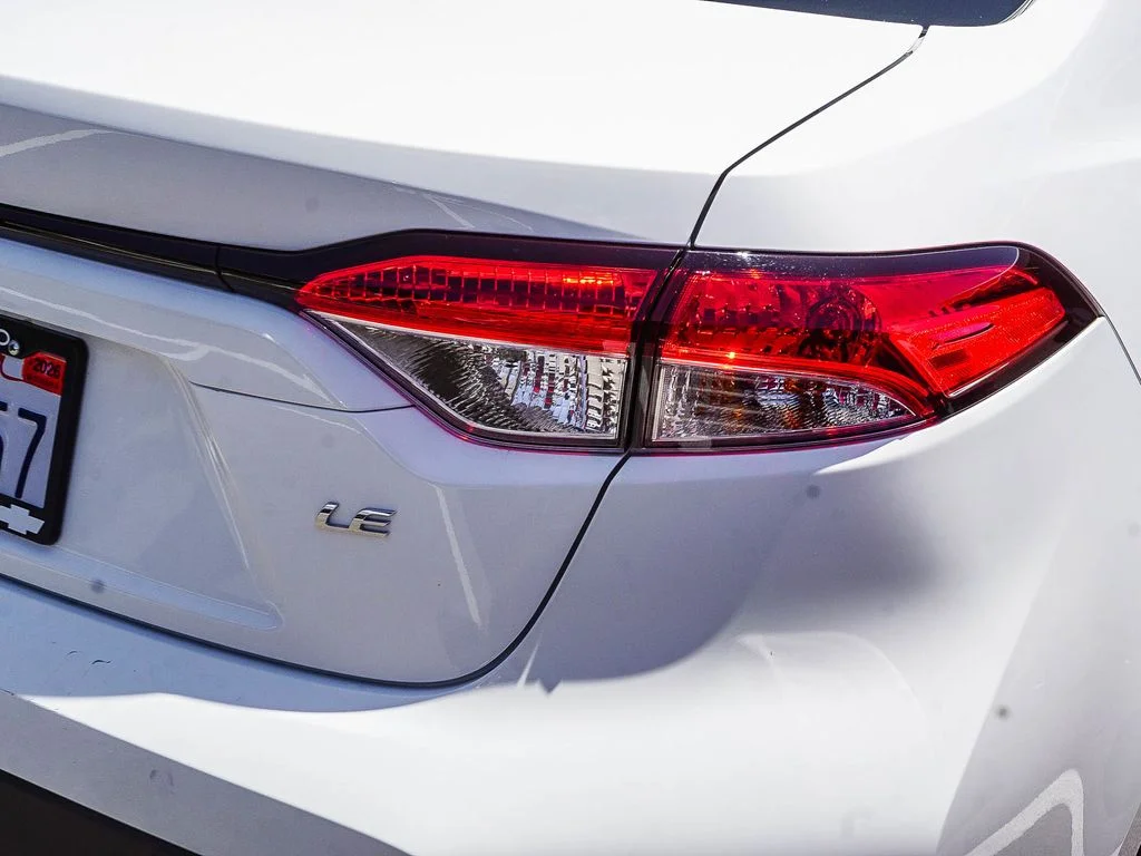 Used 2021 White Toyota LE image 7