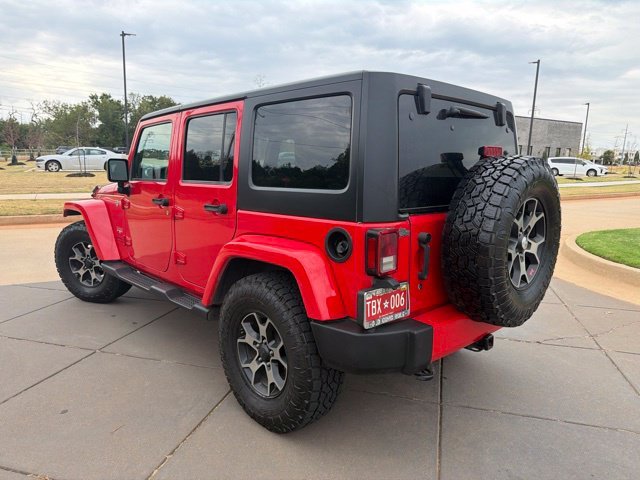 Used 2017 Red Jeep Unlimited Sahara image 3