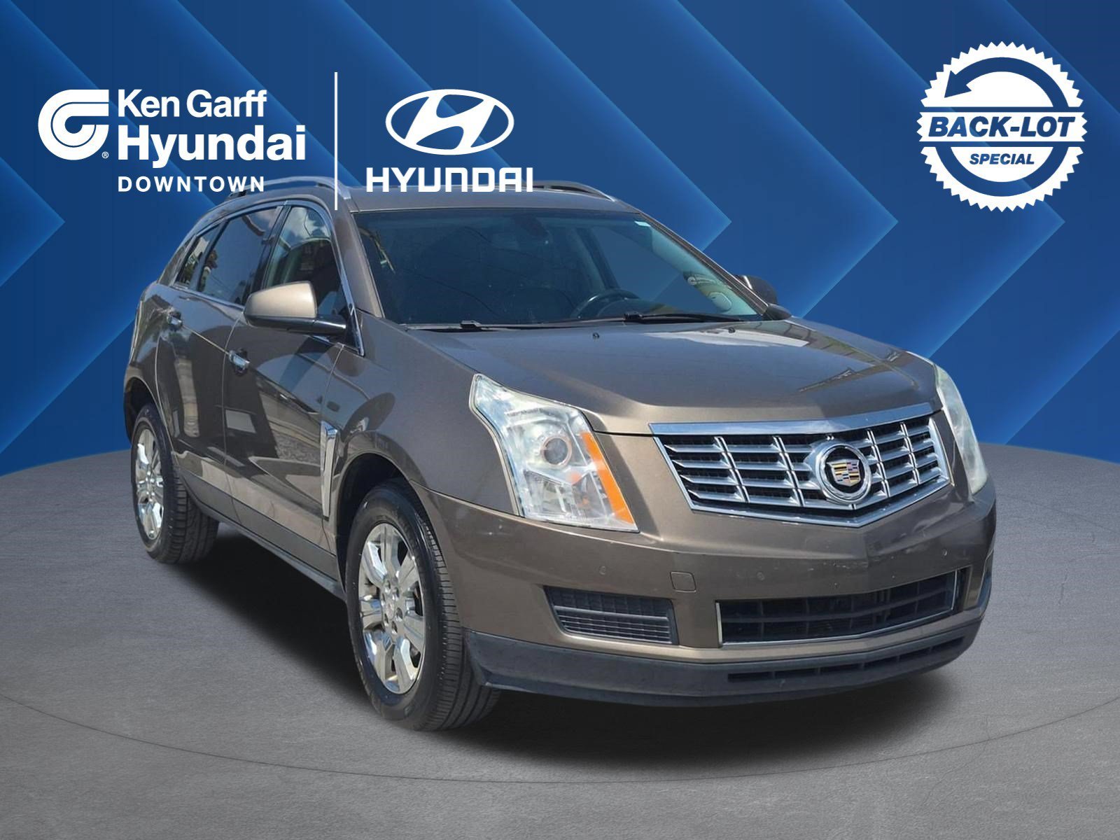 Used 2014 Terra Mocha Metallic Cadillac Luxury Collection image 1