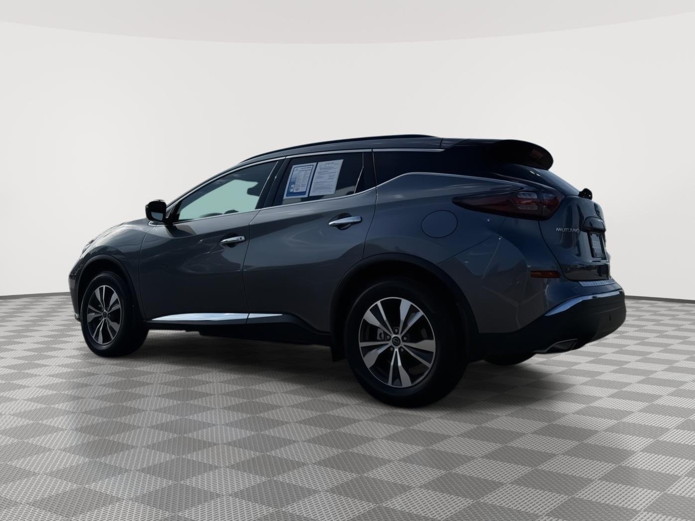 Used 2024 Gun Metallic Nissan SV image 4