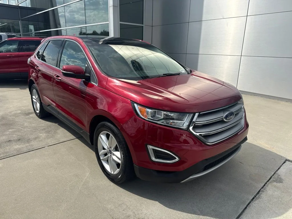 Used 2016 Ruby Red Metallic Tinted Clearcoat Ford SEL image 1
