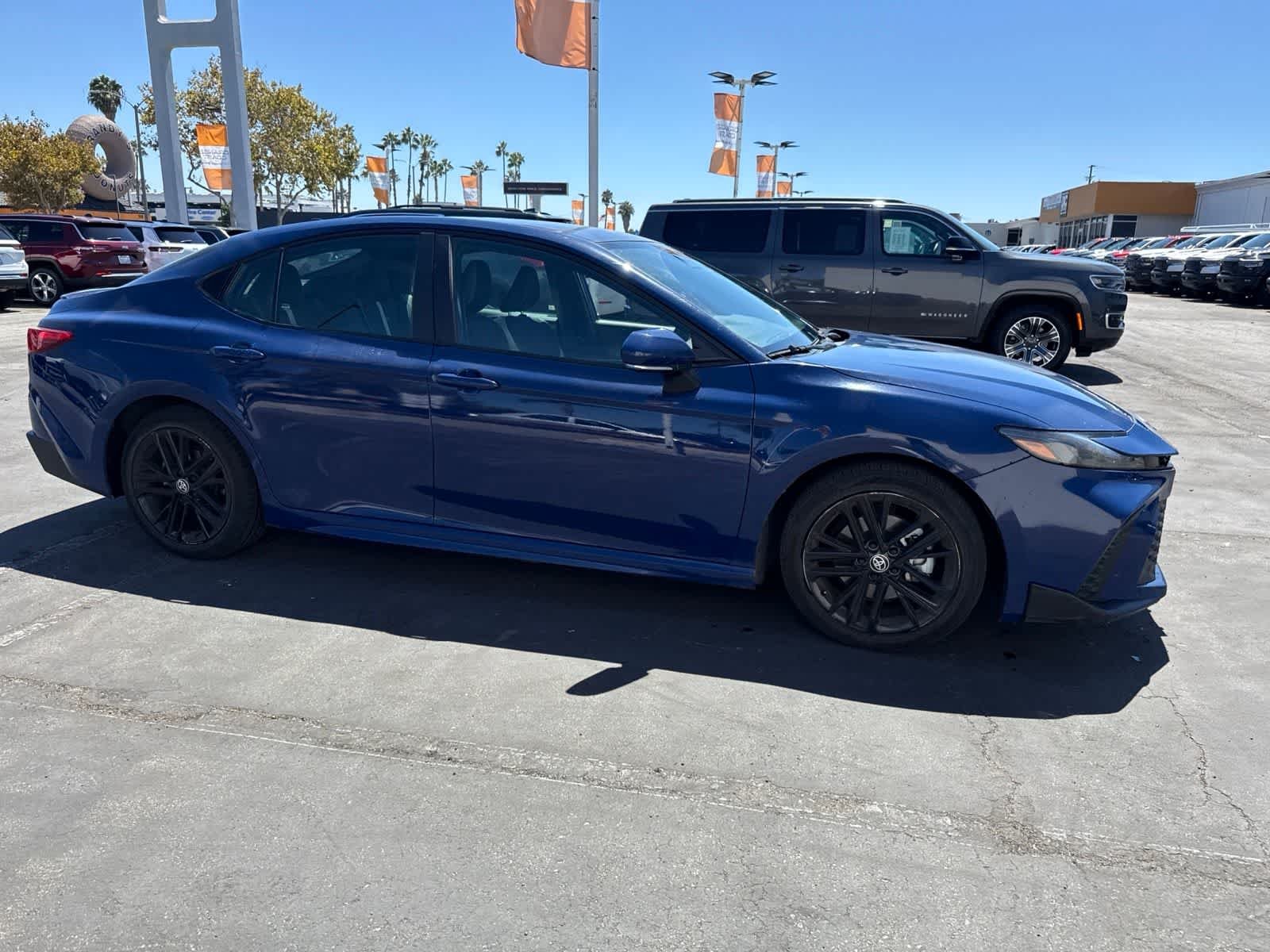 Used 2025 Reservoir Blue Toyota SE image 11