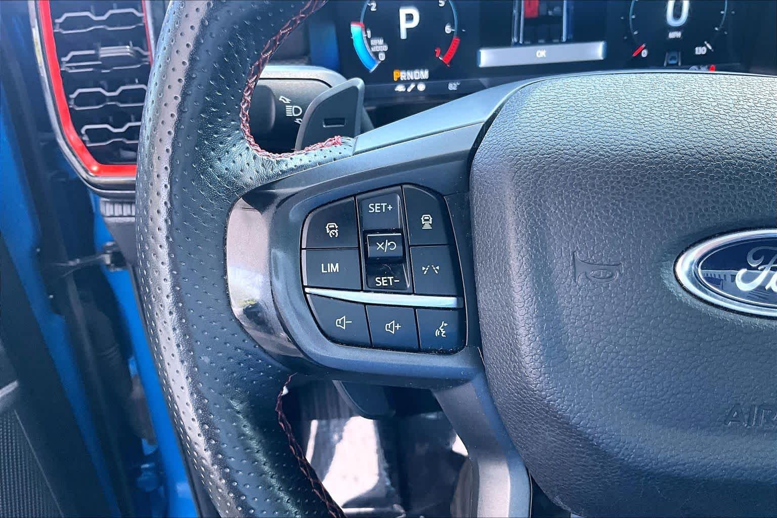 Used 2024 Velocity Blue Metallic Ford Raptor image 24