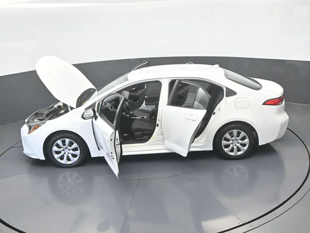 Used 2021 Super White Toyota LE image 54