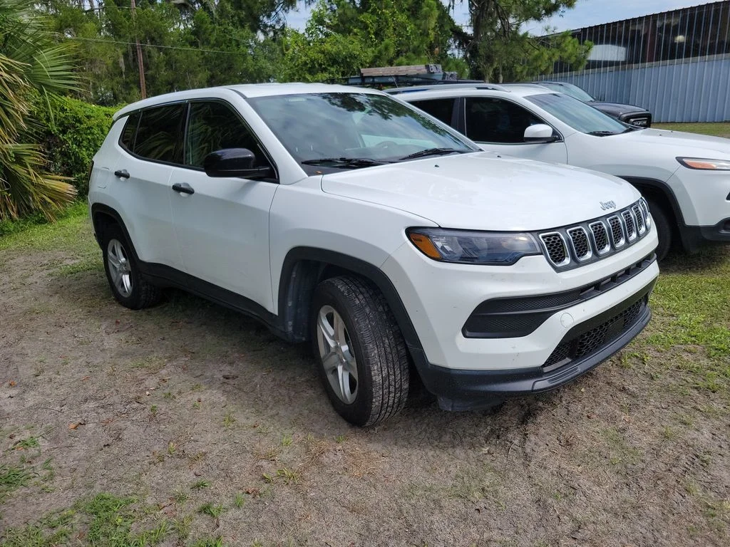 Used 2023 Bright White Clearcoat Jeep Sport image 1