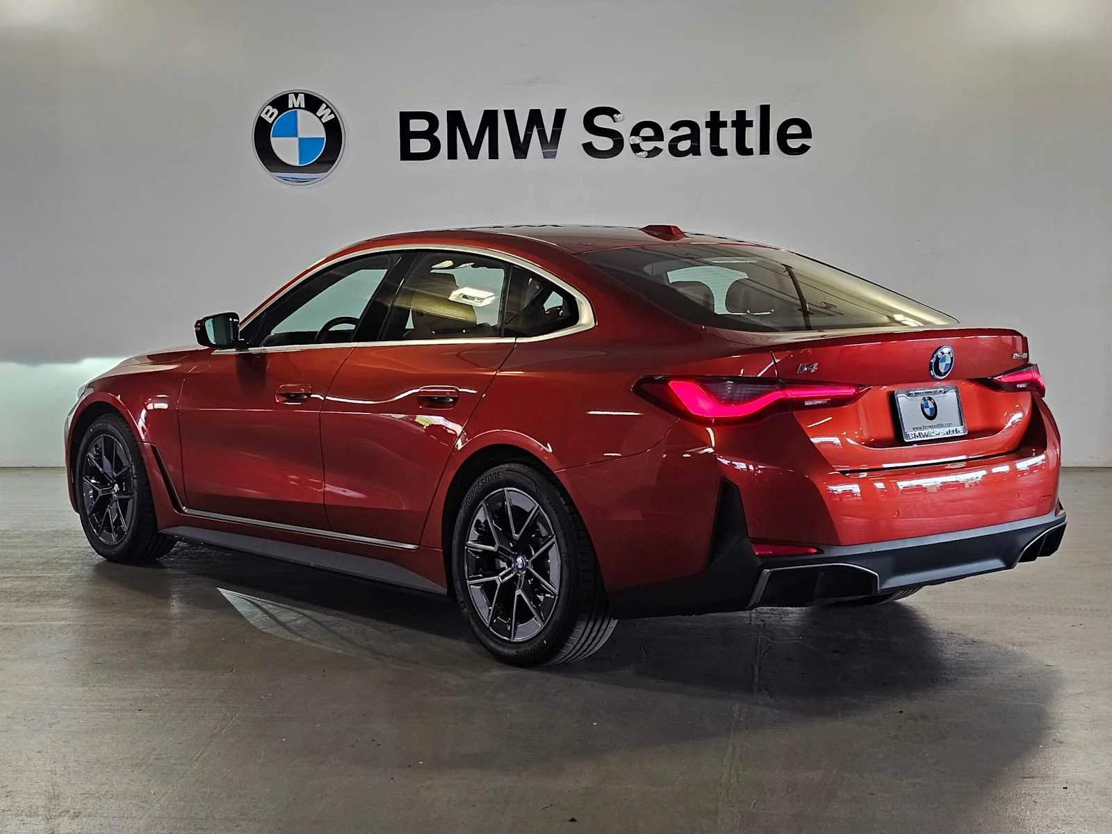 Certified Used 2023 Sunset Orange Metallic BMW eDrive35 image 4