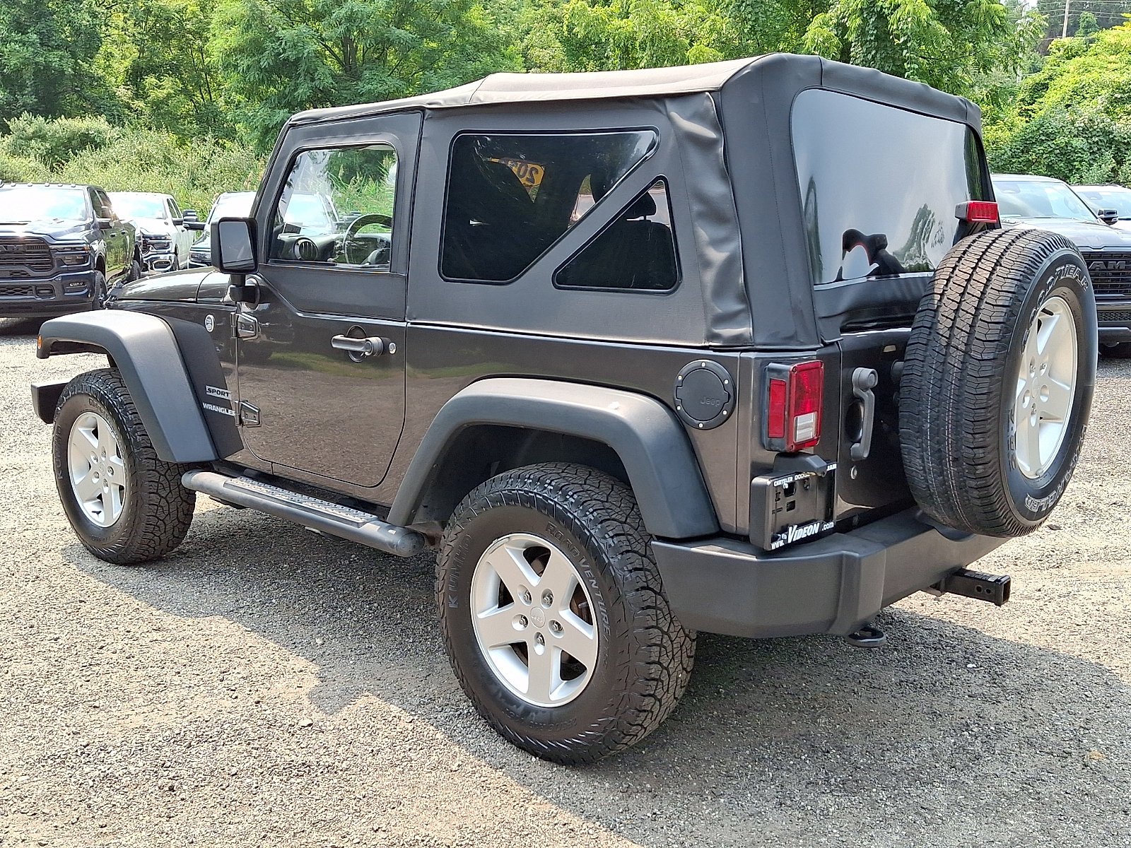 Used 2016 Granite Crystal Metallic Clearcoat Jeep Sport image 4