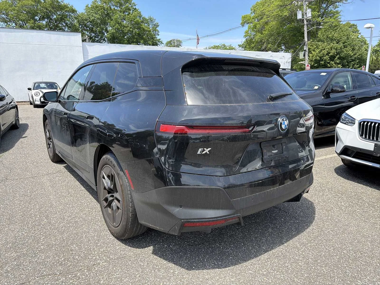 Used 2024 Black Sapphire Metallic BMW xDrive50 image 5
