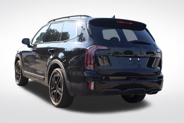 Used 2025 Ebony Black Kia EX X-Line image 9