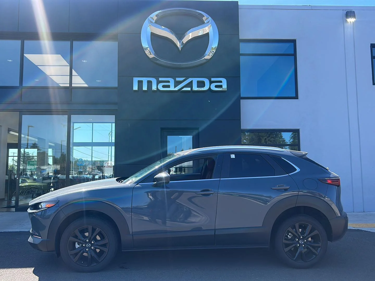 Used 2023 Polymetal Gray Metallic Mazda 2.5 S Carbon Edition image 1