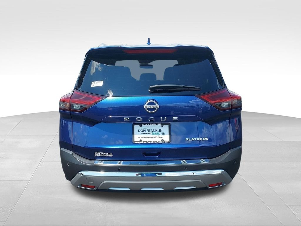 Used 2023 Blue Nissan Platinum image 4