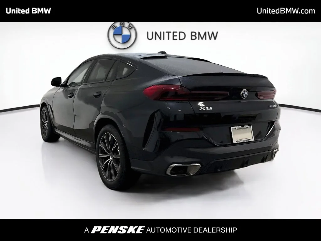 Certified Used 2025 Black Sapphire Metallic BMW xDrive40i image 7