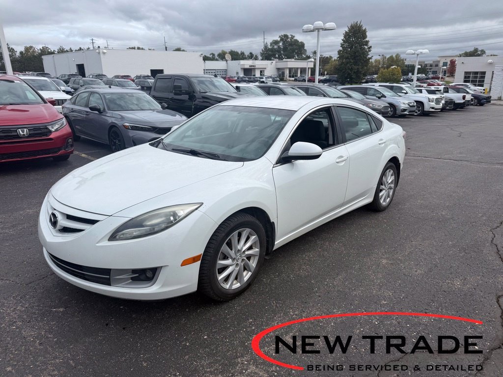 Used 2011 White Pearl Mazda i Touring Plus image 1