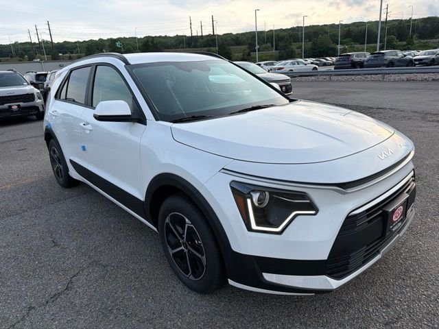 New 2026 Snow White Pearl Kia LX image 1