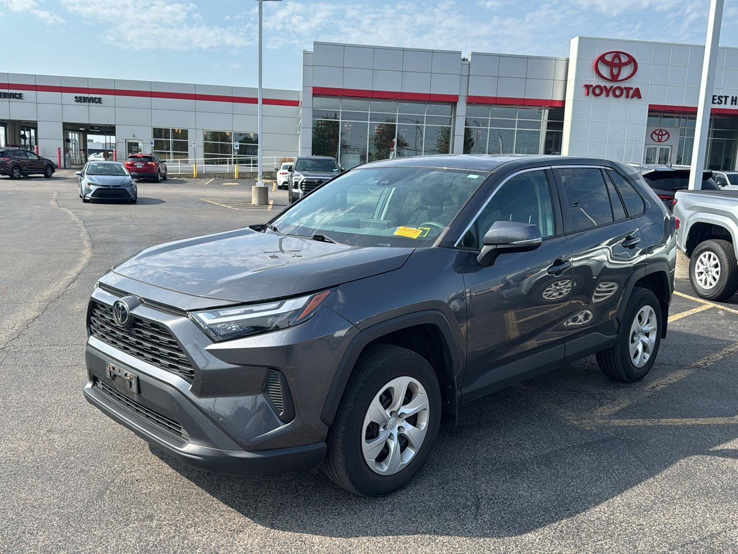 Used 2023 Magnetic Gray Metallic Toyota LE image 3
