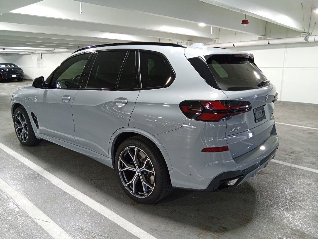 Used 2024 Brooklyn Grey Metallic BMW xDrive50e image 7