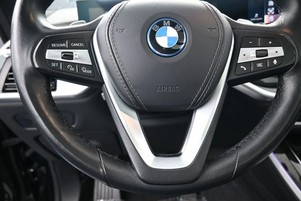 Used 2025 Black Sapphire Metallic BMW xDrive50e image 32