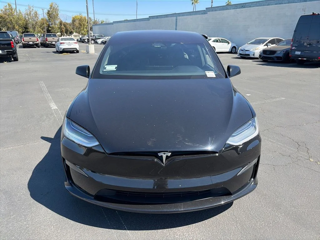 Used 2023 Solid Black Tesla Plaid image 2