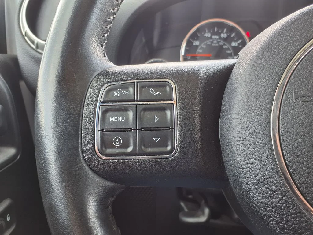 Used 2016 White Jeep Unlimited Sahara image 22