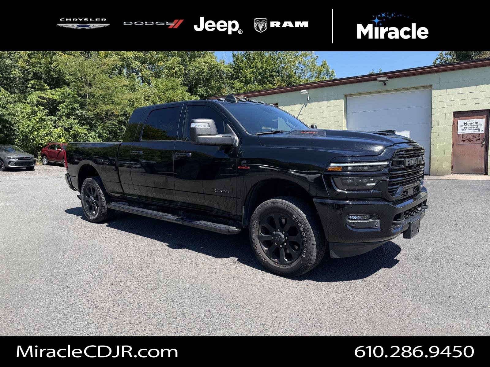 Used 2025 Diamond Black Crystal Pearlcoat Ram Laramie image 1